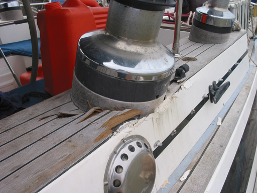 Primary sheet winch stove into the cockpit combing