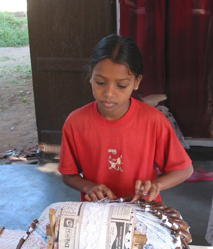 Young girl tatting
